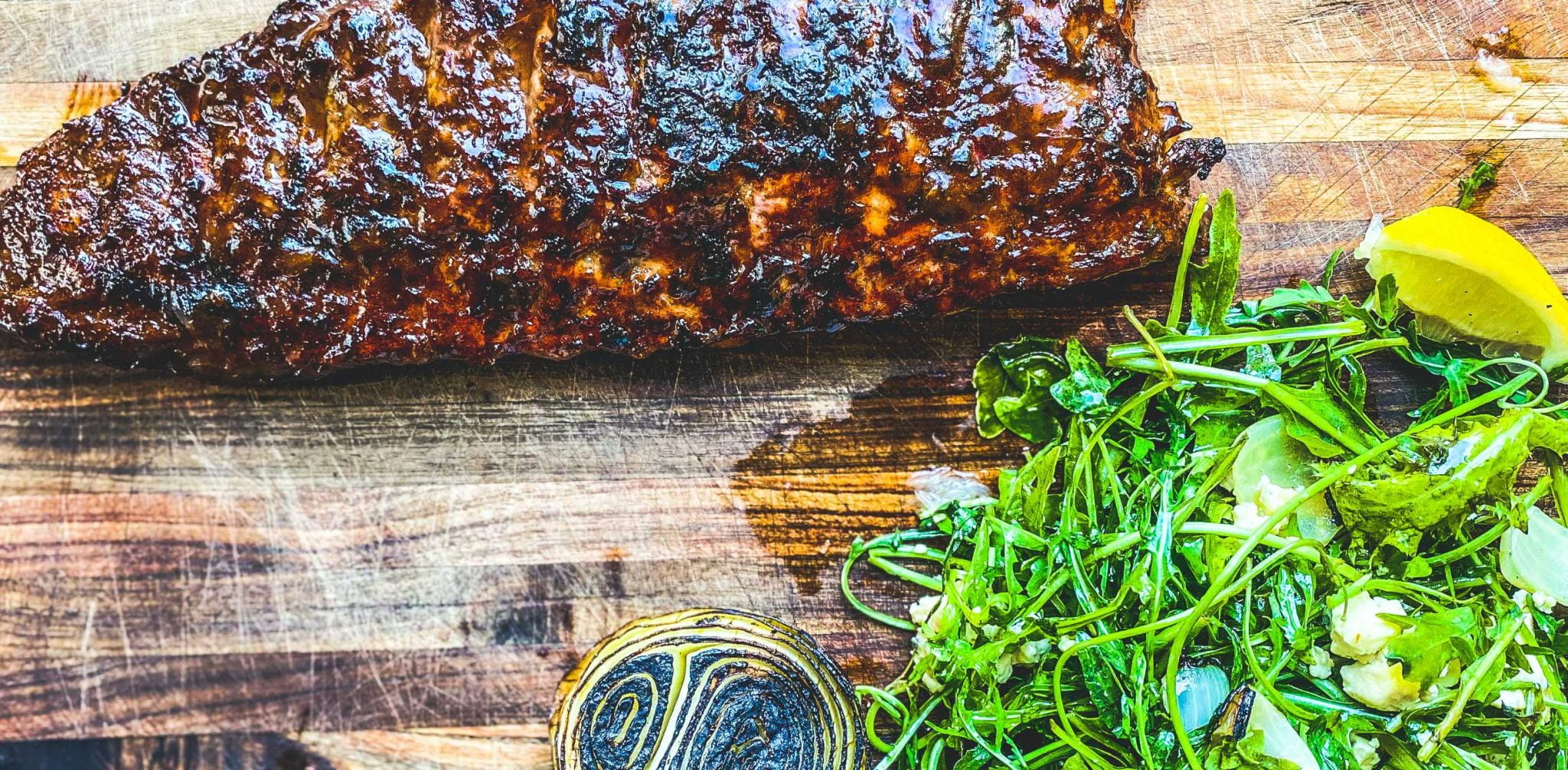 BBQ Pork Ribs with Rocket, Chared onion & Cremazola Salad